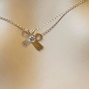 L-3: Lovely 6 prong Diamond solitaire pendant on solid 14k YG Chain.  .10 ct
